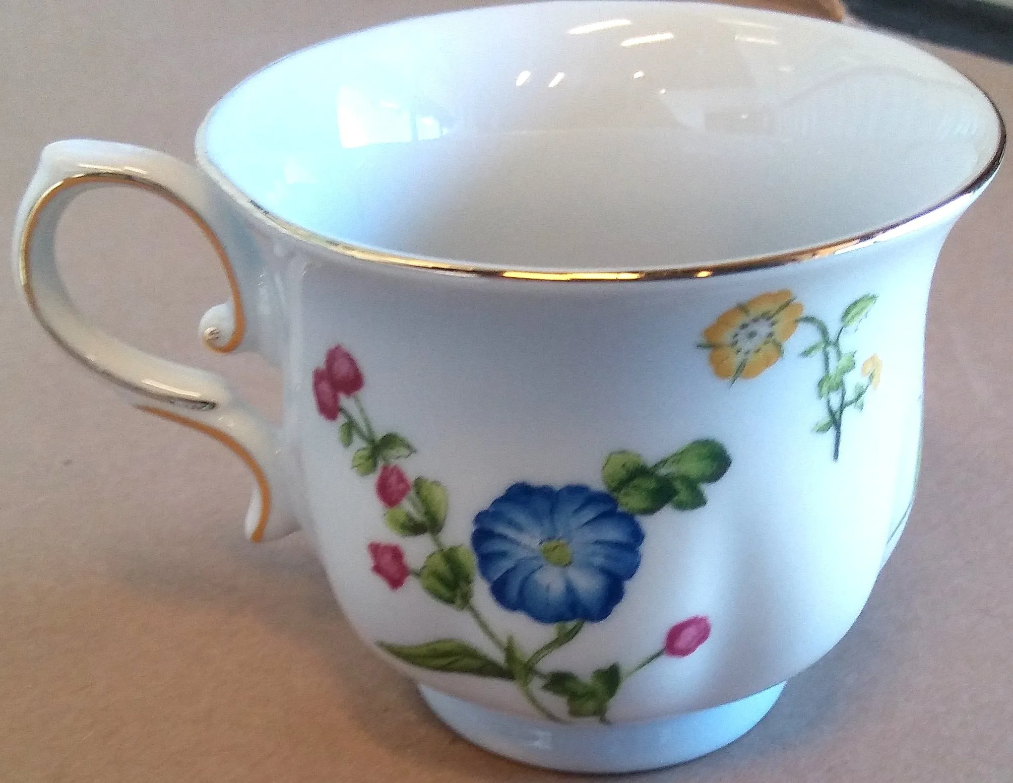 EVELINA TEA CUP AND SAUCER
