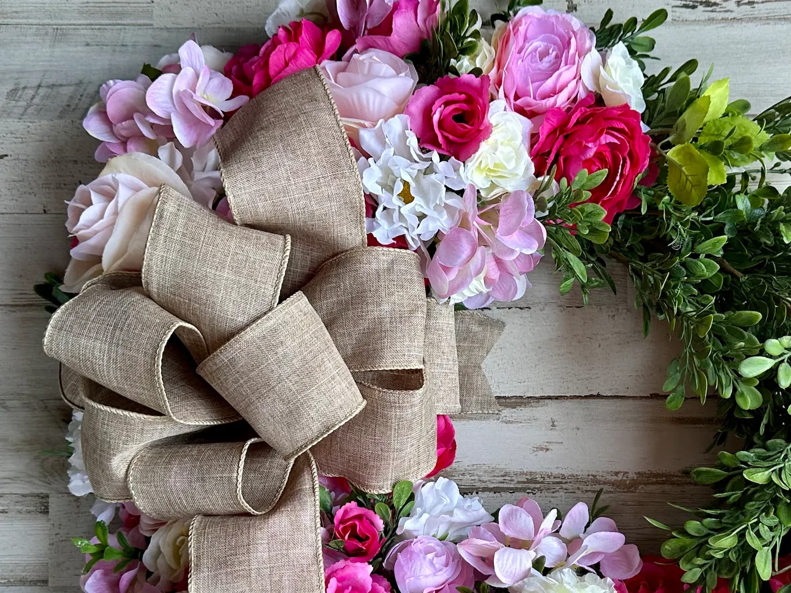 Fuchsia pink floral boxwood greenery wreath
