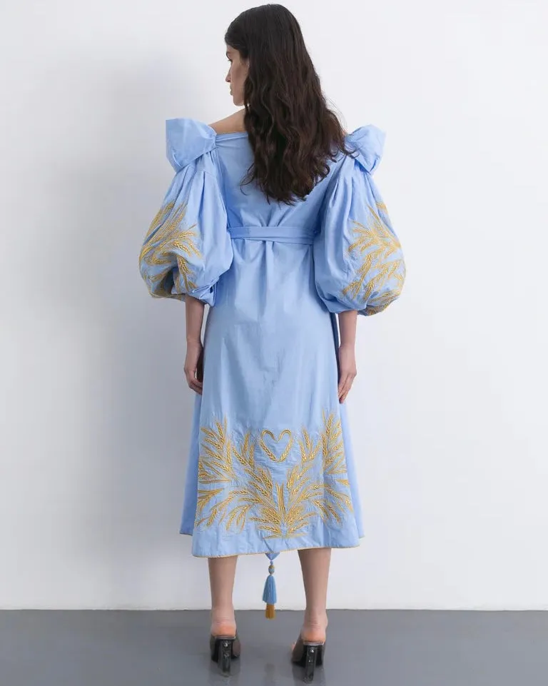 Light blue dress with gold embroidery